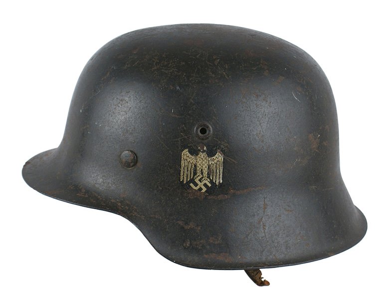 German WWII Army M1942 single decal helmet: E-027 German WWII Army M1942 - single decal. Original O.D. finish with normal field wear (scratches and scuffs). Decal shows a chip on head of eagle and at base of swastika. Leather liner is scuffed a