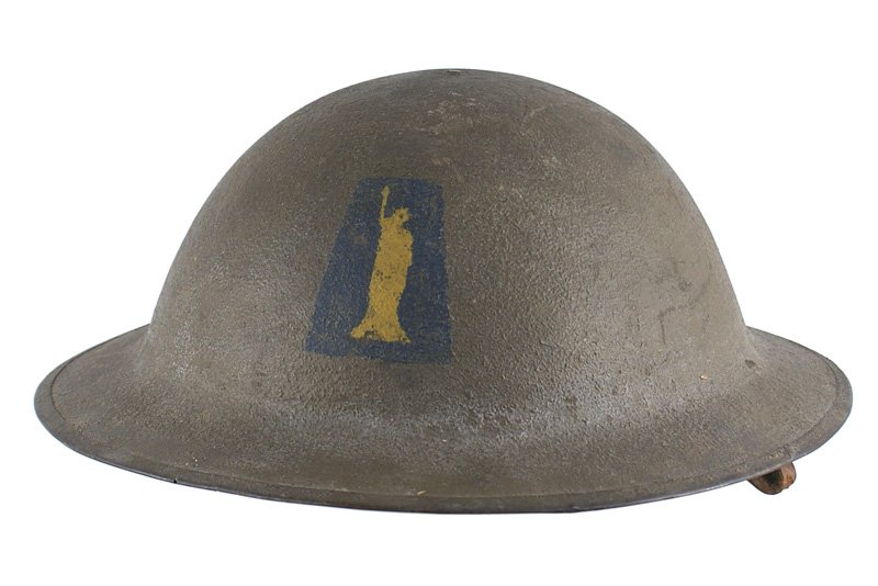 U.S. WWI doughboy 77th Division painted helmet: E-068 U.S. WWI "doughboy" 77th Division "painted" helmet. O.D. sand finish with a yellow "Statue of Liberty" on the front. Leather chinstrap and liner. II