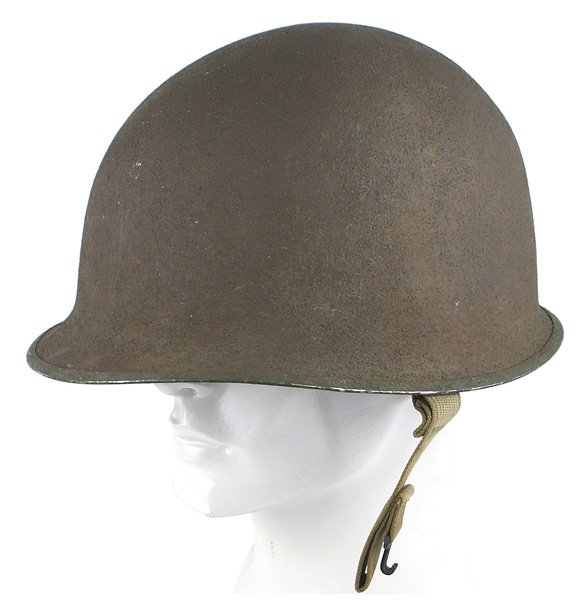 U.S. WWII M1 Army fixed bale helmet: E-083 U.S. WWII M1 Army fixed bale helmet. Light pattern of sand showing through O.D. on right side. With liner, all straps and chinstrap. II+