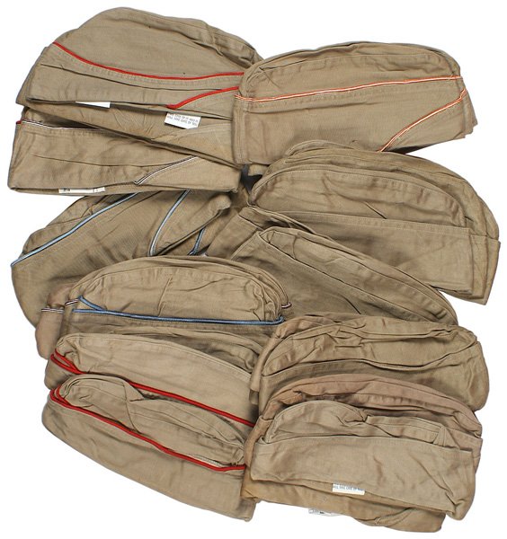 Lot 36 U.S. WWII o'seas summer caps: E-218 Lot (36) U.S. WWII o'seas summer caps. Most have color piping (red, blue, white and maroon, orange and white, etc.). With tags "COMBAT SERVICABLE", "FORT DIX", etc. Variables in bundles. All in 