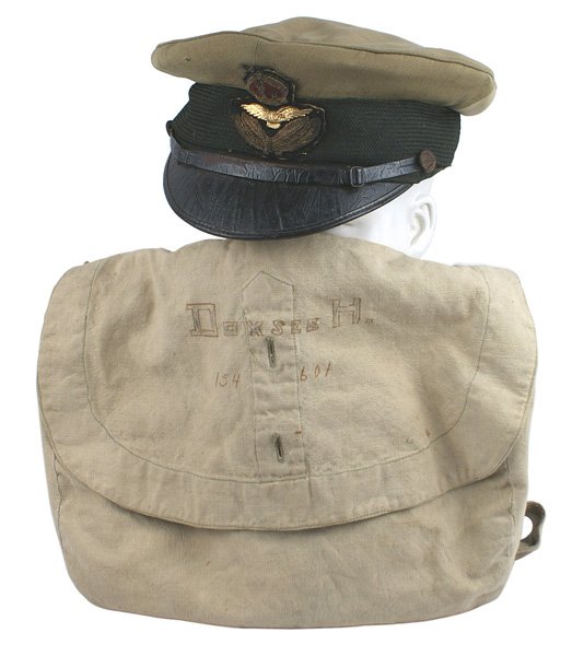 British WWI Royal Flying Corps peaked cap: E-236 British WWI Royal Flying Corps officer's peaked cap. O.D. body with a black mohair band applied over a black wool band. High relief gold bullion oak leaves/Edwardian type crown and an applied gi