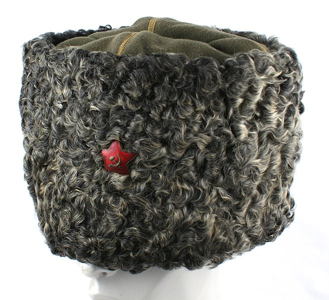 Soviet Russian WWII Cossack papacha: E-249 Soviet Russian WWII Cossack "papacha". Gray-black lamb's wool on O.D. wool with gold tape crossing top. Hooks and eyelets allow sides to be pulled down. Red enameled star with a hammer and sickl