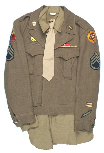 U.S. WWII Ike jacket 14th Armored: F-083 U.S. WWII "Ike" jacket. O.D. 2-pocket. Collar discs - "US" and crossed rifles. Embroidered 14th Armored and Tank Destroyer Forces shoulder "patches". Also Ruptured Duck, Sergeant chevrons, 2-in-