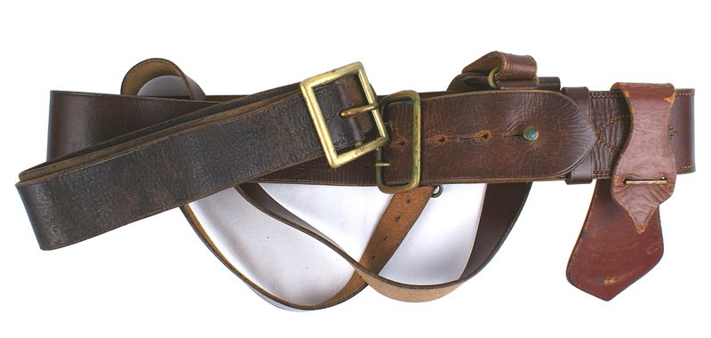 U.S. WWI Officer Sam Brown belt sword hanger: F-213 U.S. WWI Officer's "Sam Brown" leather belt with a shoulder strap and sword hanger. Also with an EM brown leather/buckle belt. II