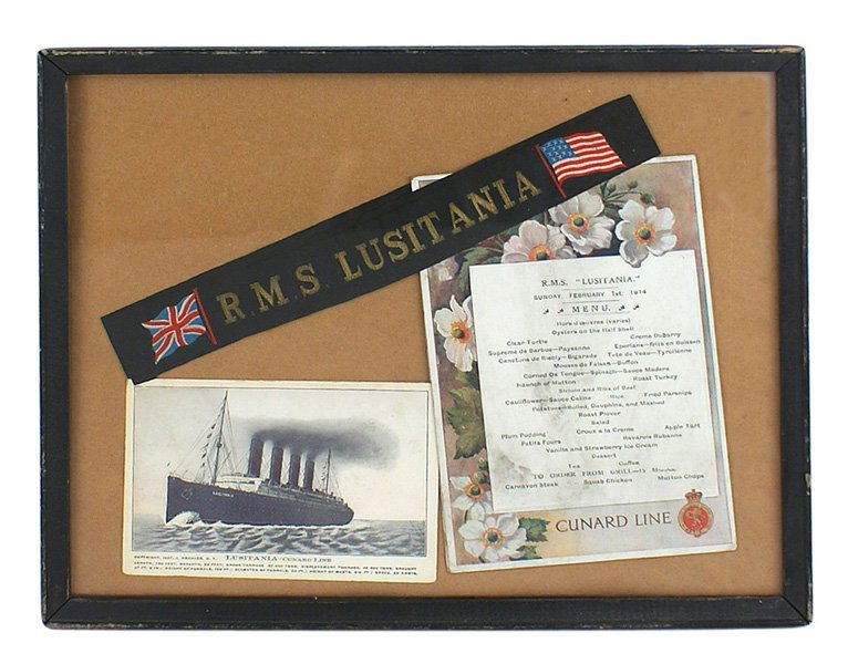 Lusitania crew member cap ribbon: S-018 Lusitania crew member's cap ribbon. Flat gold wire "R.M.S LUSITANIA" flanked by a colorful Union Jack and American flag - on a black ribbon. Framed with a 1907 postcard of the Lusitania and an o