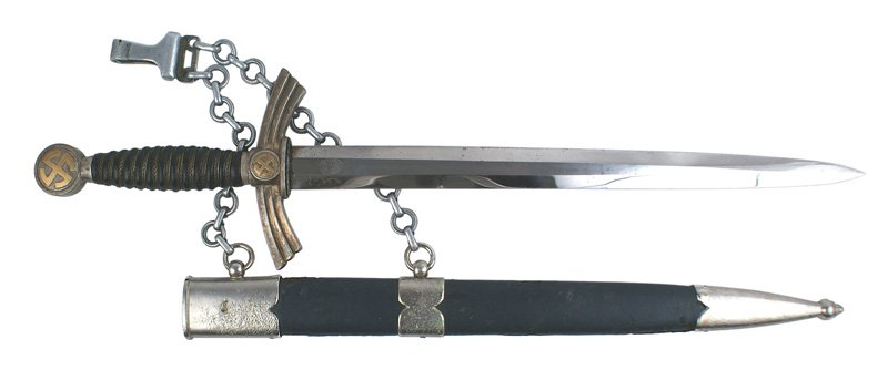 German WWII Luftwaffe 1st Model dagger: D-013 German WWII Luftwaffe 1st Model dagger. Light wear on back of leather grip. Patina on pommel and crossguard. Fairly clean "CARL EICKHORN - SOLINGEN" squirrel logo. 12" blade. Pitting on throat a