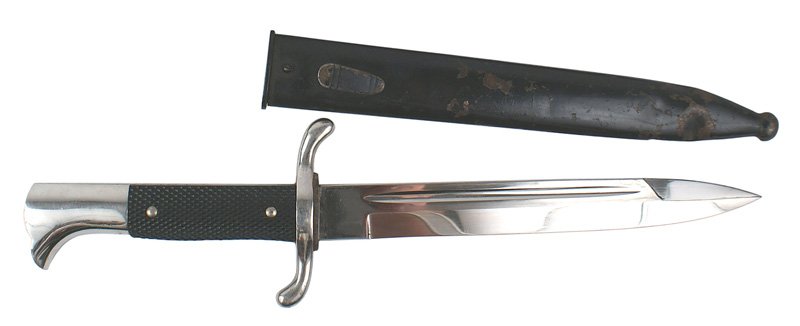 German WWII Fire Department sidearm: D-022 German WWII Fire Department sidearm. Excellent 7 7/8" blade with a 2 1/4" top "false edge" near the tip. Seated squirrel "Eickhorn - SOLINGEN" logo. Leather washer. Some paint chips on scabbard 