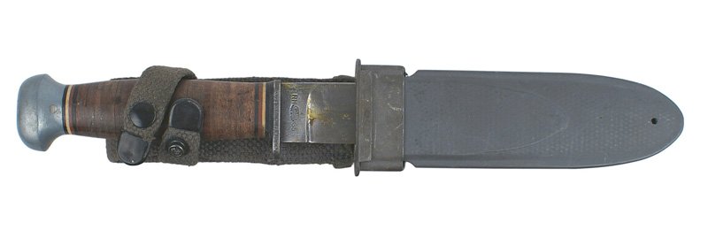 U.S. Navy WWII MARK I fighting knife: D-033 U.S. Navy WWII MARK I fighting knife. Leather rings handle. Aluminum knob pommel and short steel crossguard. 5 1/4" clean blade with a Bowie type point. Marked "U.S.N. MARK I" and "RH-PAL-35". G