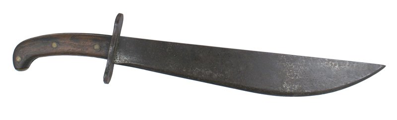 U.S. M1909 bolo knife: D-054 U.S. M1909 bolo knife. Wood grips with a "bird head" pommel, brass tip and 3 flat rivets. Steel crossguard. 2 1/4" wide blade towards the tip, 13 3/4" long. Marked "PLUMB-PHILA", a flaming grena