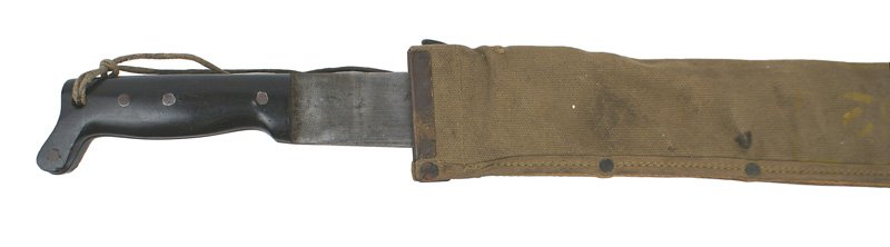 U.S. Navy MK1 machete: D-068 U.S. Navy MK1 machete. Black plastic grip with an 18" blade-marked "LEGITIMUS COLLINS & CO 1942". Gray and shows some wear. O.D. canvas scabbard with a belt hook. Marked "U.S.M.C... 1943". With