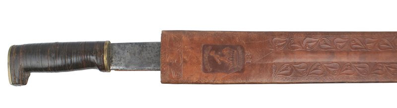 U.S. WWII GI altered Collins machete: D-069 U.S. WWII GI altered Collins machete. 18" blade - marked "COLLINS & CO....". Gray/black patches. Handle was replaced with brass ovals on each end of the leather rings. Tooled leather scabbard. I