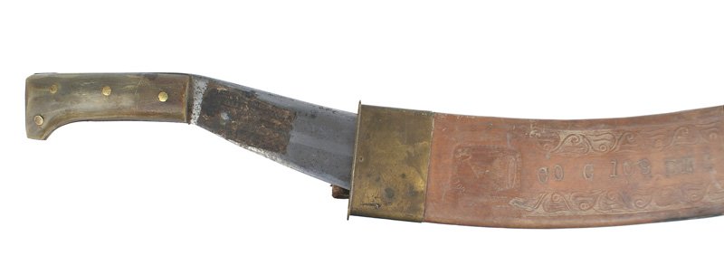 U.S. WWII Collins Army machete: D-070 U.S. WWII Collins Army machete. Used by an Engineer group. Green horn handle with 4 flat brass rivets. 15" radically curved blade - marked "COLLINS & CO HARTFORD NO 1005". Fairly clean with the