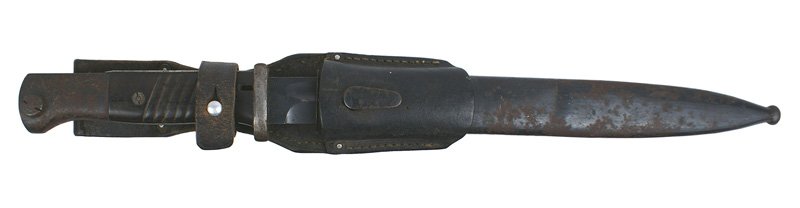 German WWII Mauser K98 bayonet: D-110 German WWII Mauser K-98 bayonet. Light rust on pommel. Bakelite grips. 9 7/8" blade retains 90% of the original blued finish. Marked "E. PACK & S." and "5799d". Dented scabbard with 50% of the o