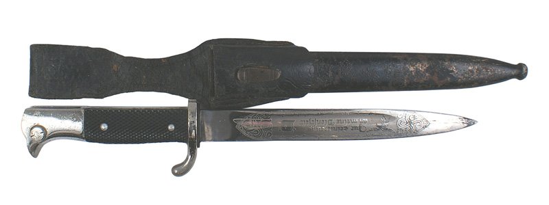 German WWII Luftwaffe engraved bayonet: D-114 German WWII Luftwaffe engraved bayonet. Dress type. Pommel and crossguard have some aged graying. Black bakelite checkered grips. 7 7/8" blade etched with a panel bearing a Luft eagle/swastika, 