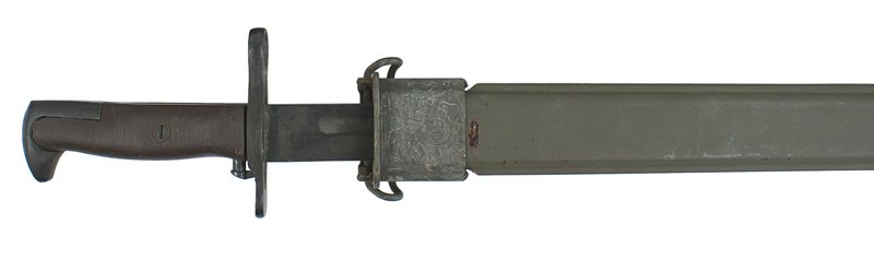 U.S. WWII M1942 bayonet: D-124 U.S. WWII M1942 bayonet - darkened pommel and crossguard/muzzle ring, lined black plastic grips and a 16" parkerized blade. Marked with a flaming grenade, "OL" (Oneida Ltd.), "US" and "1942". Gr