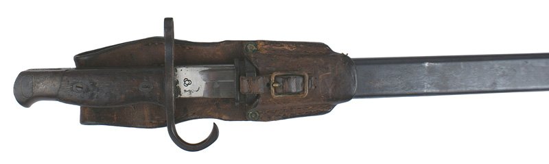 Japanese Arisaka M1897 bayonet: D-141 Japanese Arisaka M1897 bayonet. Darkened metal fittings. Clean 15 1/2" steel blade with a Kokura Arsenal stamping. 95% original bluing on the scabbard. Leather frog shows some expected wear. II+