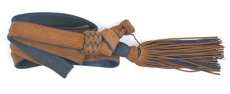 Japanese WWII Navy katana/sword portopee: D-160 Japanese WWII Navy katana/sword portopee. Light brown with a blue underlay, strap and tassel. II