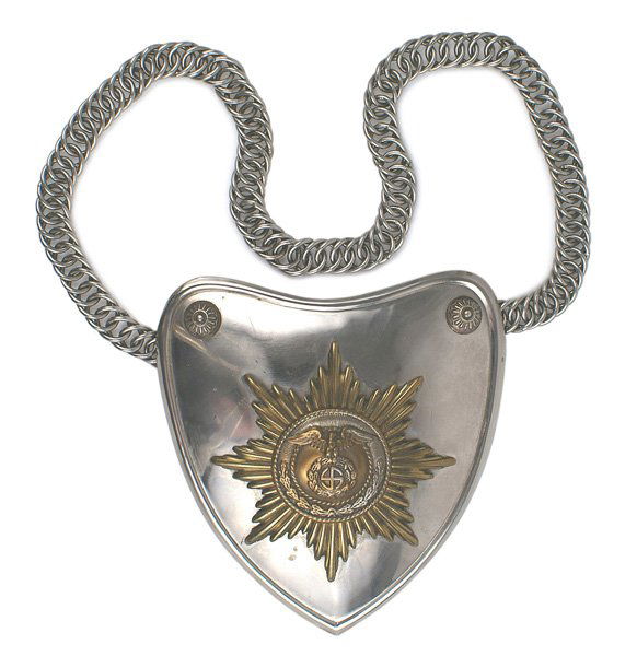 German WWII SA SS gorget: H-088 German WWII SA/SS heart-shaped gorget. Brass relief eagle/sun wheel swastika on the center panel - affixed to a gilt sunburst - mounted on a convex nickled shield. Domed gilt bosses with designs