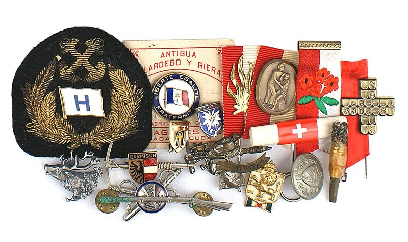 Lot of miscellaneous insignia pins German etc: H-190 Lot of miscellaneous insignia and pins: (1) Commercial shipping lines captain's gold bullion cap wreath. White enameled flag with an "H". (2) Cuban made French enameled pin - flag, etc. ON origi