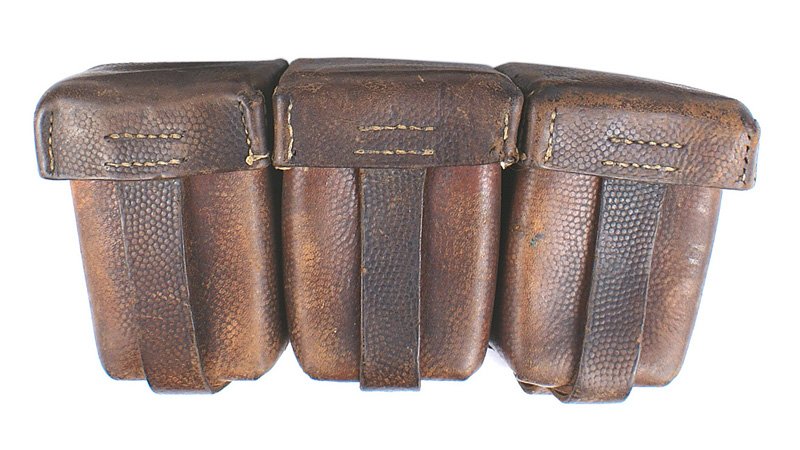 German WWI Mauser cartridge box: M-025 German WWI Mauser 3-compartment leather cartridge box. Inside lid is dated "1914". Reverse marked with maker and dated "1914". Two belt loops and "D" ring. II
