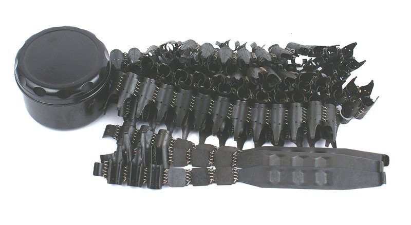 Lot 3 German WWII MG-34-MG42 gun belts: M-037 Lot of 3 German WII chain link MG-34-MG42 machine gun belts. Also three starter tabs and bakelite grease container. II