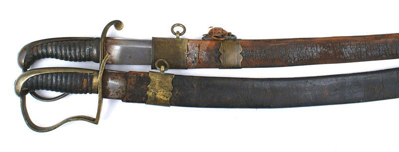 Lot of 2 U.S. Militia swords: K-021 Lot of 2 U.S. Militia swords: (1) Aged darkened brass pommel/backstrap, reverse "P" knuckle bow and crossguard. Ribbed black leather covered grip. 32 1/2" curved blade. Fuller along top edge. Sh