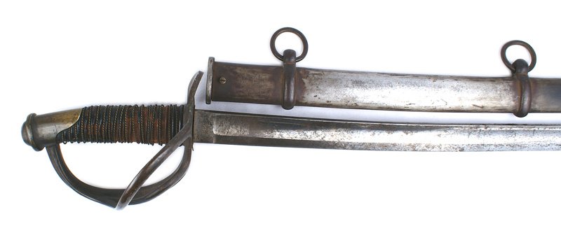 U.S. M1840 wrist breaker Cavalry saber: K-034 U.S. M1840 "wrist breaker" Cavalry saber - but a slightly smaller scale. The entire brass guard has age darkened. 50% of the leather wrapped grip remains as well as all of the braided wire. 35 1