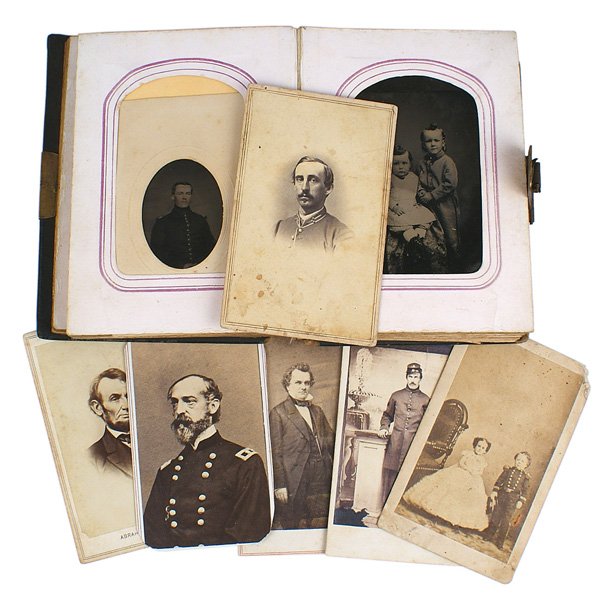 Civil War photo album.: K-062 Civil War photo album. 5 1/4" x 4" x 2 1/2". leatherette cover is detached. War time photos include CDV's: Lincoln, Gen. Burnside (clipped corners), Steven Douglas, soldier in a frock coat and k