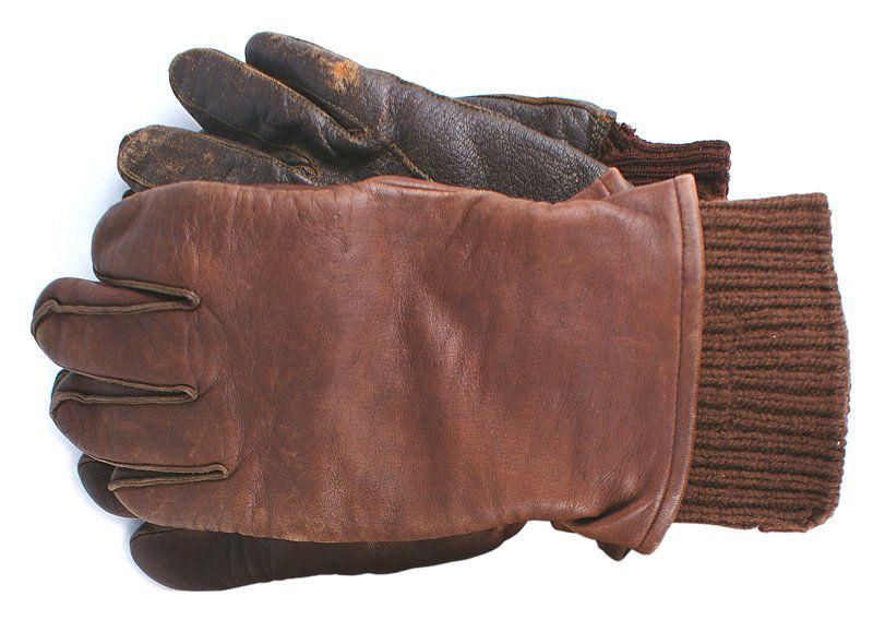 Lot of 2 U.S. WWII Army pairs of gloves: N-052 Lot of 2 U.S. WWII Army pairs of gloves: (1) USAAF type "TYPE A -11A" brown leather gloves with brown knit wool inserts (2 moth bites). (2) Army "TYPE A-10" leather gloves. Show wear and one kni