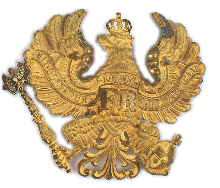 Imperial Prussian line officer helmet plate: E-032 Imperial German Prussian line officer helmet plate. Fire gilt finish worn form the tip of the left wing. Small eagle has been replaced at the top of the scepter. Small folding pins on reverse. I