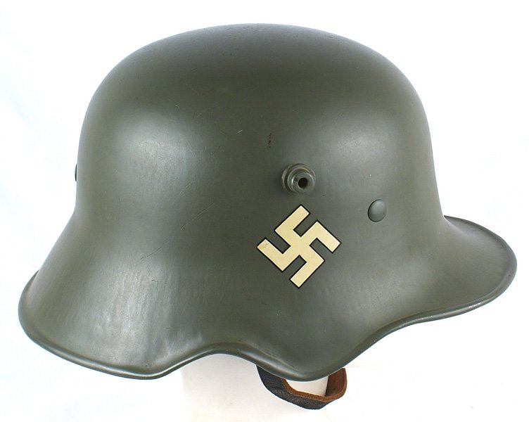 Goring Prussian Police cut-out helmet: E-080 Hermann Goring - Prussian Police "cut-out" 1934-type helmet. Professionally restored. With original light green paint and original correct decals (tilted swastika and slanted National Shield). L