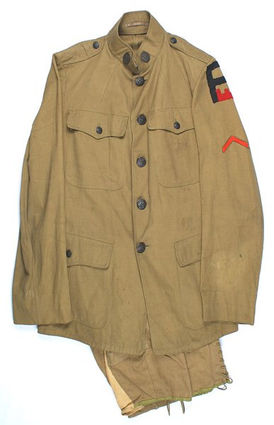 U.S. WWI 1st Army Engineer uniform: F-037 U.S. WWI 1st Army Engineer uniform: Cotton four-pocket stand-up collar tunic. Has both collar discs - "US" and "D"/castle. Red cloth "castle" under the legs of a large black "A". Red Discharge C