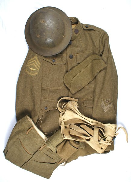 U.S. WWI AERO uniform group tunic etc named: F-053 U.S. WWI AERO grouping of Cpl. Paul B. Parce: (1) Tunic with Staff Sgt. Stripes and gold embroidered winged propeller. Collar discs - "U.S." and winged propeller. Lower right sleeve with two sil
