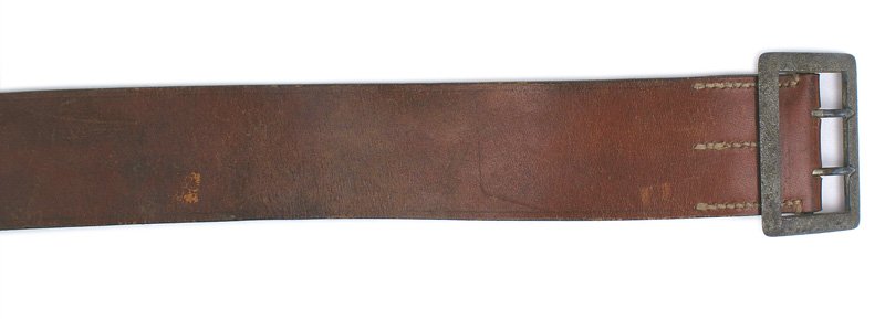 German WWII Army officer service belt: F-108 German WWII Army officer's 2 1/4" wide brown leather service belt. Marked with name of maker and dated "1942". Large age toned 2-prong open pebbled buckle. Size 41. II