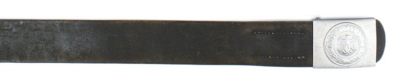 German WWII Army EM belt: F-115 German WWII Army EM leather belt and buckle - pebbled aluminum buckle. Black leather belt. Size 36. Tab has opened and metal hook is missing. Shows some wear. II