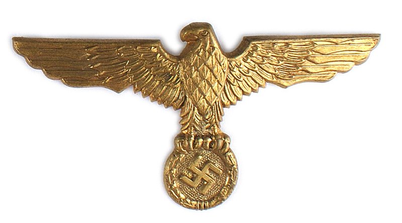 German WWII Navy breast eagle: F-130 German WWII Navy age toned, gilt-brass metal breast eagle/swastika for summer white officer's tunic. Pin-back with a thread loop hook. II
