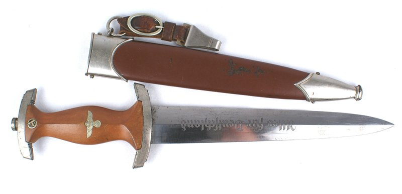 German WWII SA dagger: D-002 German WWII SA dagger. Age toned crossguards. Small chip on reverse bottom of wood grip. Clean blade marked "RZM - M7/13". Scabbard has some small worn areas to the finish. Leather hanger in ver