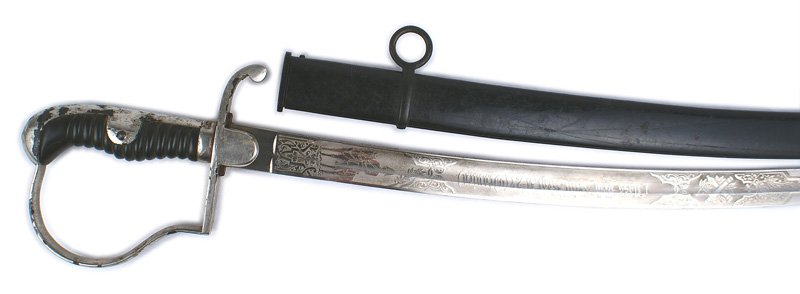 Prussian Artillery Junkersabel sword: D-038 "Junkersabel" similar to above. Black horn grip. Worn areas to the nickeled finish on the guard. Excellent 1" wide curved blade etched with a mounted figure, crossed cannons, floral work and a p