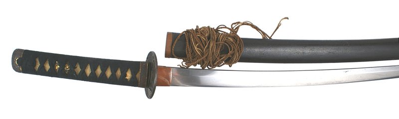 Japanese Wakizashi samurai sword: D-049 Japanese "Wakizashi". Dark green cord wrapped white sharkskin grip. Silver and gold highlights on the figural menuki. "Basket weave" design on the fuchi-kashira. Darkened bronze tsuba decorated 
