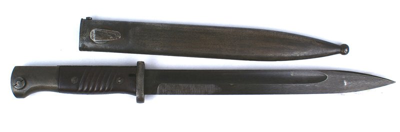 German WWII K-98 Mauser bayonet: D-070 German WWII K-98 Mauser bayonet. Bakelite grips. Darkened fittings. 95% bluing on blade - marked "458 n" and "44fnJ". Matching numbers on scabbard with 20% finish. Frog hook scratched. II