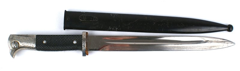 German WWII Army parade bayonet: D-080 Army Third-Reich parade dress bayonet - missing the turned-up tip of the guard. Pommel has spotted dimples coming through the nickel finish. Clean 9 3/8" blade - marked with the scales logo and 