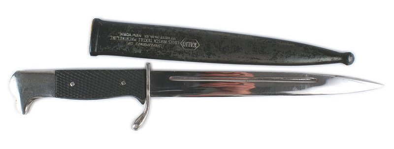 German WWII miniature dress bayonet: D-083 Third-Reich miniature dress bayonet. With original polished steel pommel and crossguard. Grips as above. 5 1/2" excellent blade is marked "STOEKER -GERMANY". 50% of the black finish on the scabb