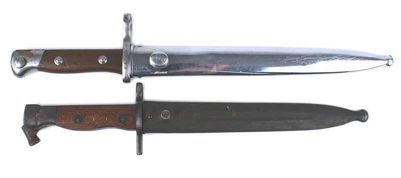 Lot of 2 bayonets Swedish Mauser: D-112 Lot of 2 bayonets: (1) Chili M1899. Nickeled pommel and high muzzle ring on the crossguard. Excellent 10" blade marked with the National Shield and maker "WEYERSBERG KIRSCHBAUM & CO - SOLINGEN".