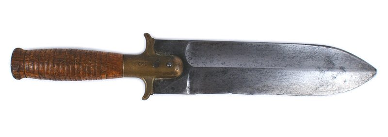 U.S. M1880 hunting knife: D-232 M1880 hunting knife. 2" wide, 8 1/2" blade is graying and shows wear and use. Ribbed wood grip (pommel has an old chip) with an extended brass ferrule. Marked "US SPRINGFIELD" and "4411". II-