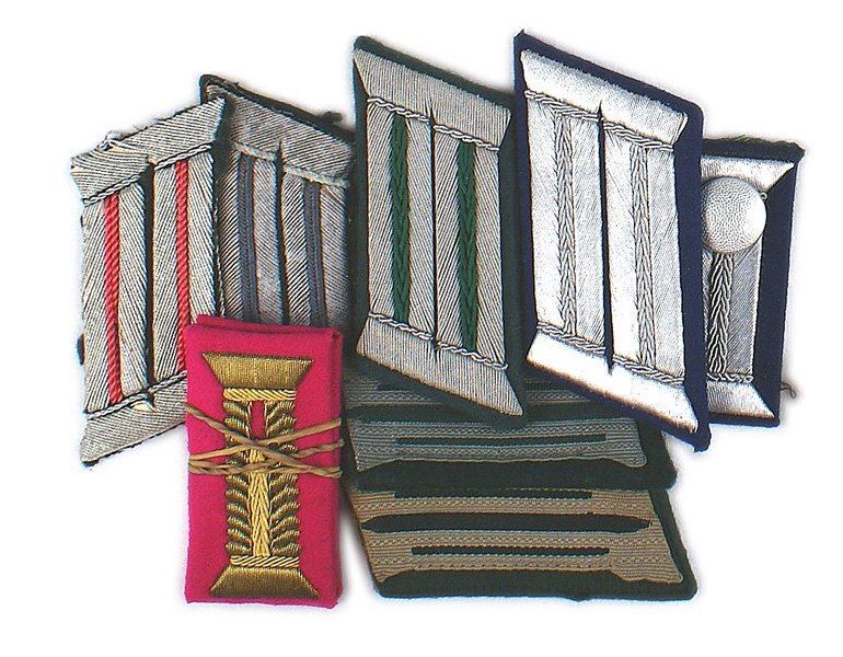 Lot of German WWII Army single collar tabs: H-029 Lot of Army single collar tabs: NCO, Jager and Pioneer; Officer; Propaganda, Mountain troops, Medical Parade dress and Panzer (missing backing). Also dress cuff tabs - two gold General Staff and
