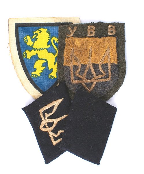 Post-1945 Ukrainian insignia Waffen-SS: H-056 Lot of post-1945 veteran made Ukrainian uniform insignia: (1) 14th Waffen-SS Grenadier Division collar tabs. Hand embroidered white "Trident of Volodmyr the Great" and a blank tab. (2) Ukrainian