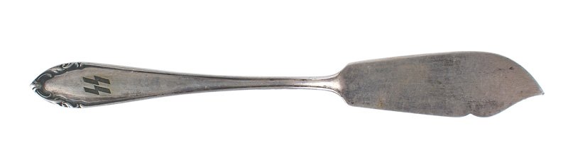 SS officer fish knife: H-080 SS officer's mess hall silver fish knife. Darkened "SS" runes engraved on handle. Reverse marked "E", "800" and silver marks (crescent and a crown). 7 5/8". II