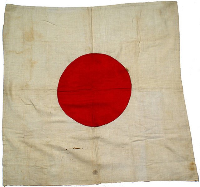 Japanese WWII cotton meatball flag: H-176 Japanese cotton "meatball" flag. 41" x 57". Some foxing. Cord ties in corners. II