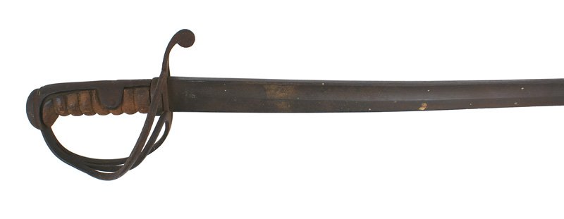 Tiffany M1861 Cavalry Saber sword: K-027 Tiffany M1861 Cavalry Saber. All iron pommel/backstrap and 3-branch guard - rusted and darkened. Leather worn away from the grip. 35 3/4" slightly curved, heavy blade with a fuller. Marked with