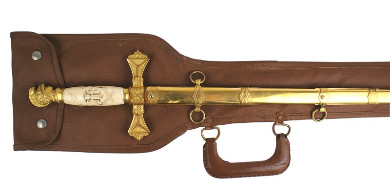 Knights Templar gilt dress sword: K-110 Knights Templar gilt dress sword. Detailed Knight helmet pommel, Maltese Cross in the center of the gilt crossguard bearing a triangle on each end. White bone grip with a cross and initials with